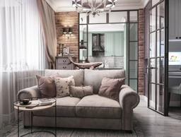 Căn hộ 38m² của cặp vợ chồng son với tường gạch trầm ấm và góc bếp màu xanh bơ tuyệt đẹp