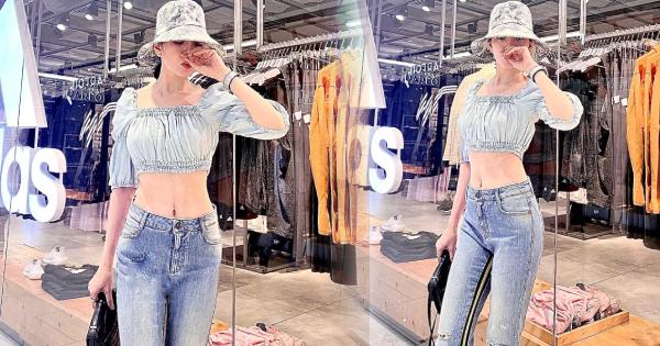 Lệ Quyên chụp ảnh cạnh đường thẳng để khẳng định mình "cong" tự nhiên