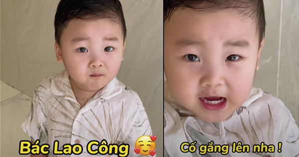 Con trai Hòa Minzy tặng quà bác lao công với biểu cảm đáng yêu