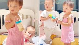 Lisa nhà Hà Hồ mới hơn 1 tuổi đã ra dáng chị cả, thay mẹ đút sữa cho em trai