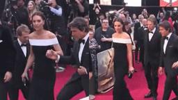 Công nương Kate được Tom Cruise dìu tay lên thảm đỏ nhưng biểu cảm của cô mới chiếm spotlight