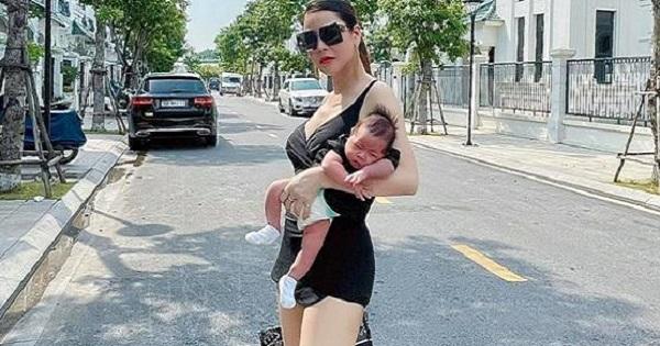 Đưa quý tử dạo phố, Quế Vân bị nhắc nhở cách bế con như xách đồ chơi