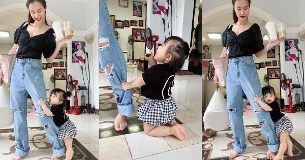 Con gái Đông Nhi đu chân mẹ không cho đi làm