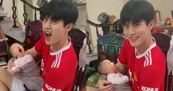 Trai đẹp 9X đăng clip bế cháu, nhiều chị em đòi thay vị trí của em bé