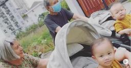 Mẹ chồng người Thụy Điển của Hồ Ngọc Hà mặc đồ ngủ Việt Nam đẩy xe cho cháu đi dạo ngoài đường