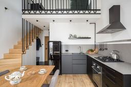Căn hộ 52m² ở Ba Lan với phòng khách được bố trí trên tầng lửng