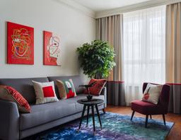 Căn hộ 35m² nổi bật sắc đỏ cùng thiết kế phòng khách, phòng ngủ "2 trong 1"