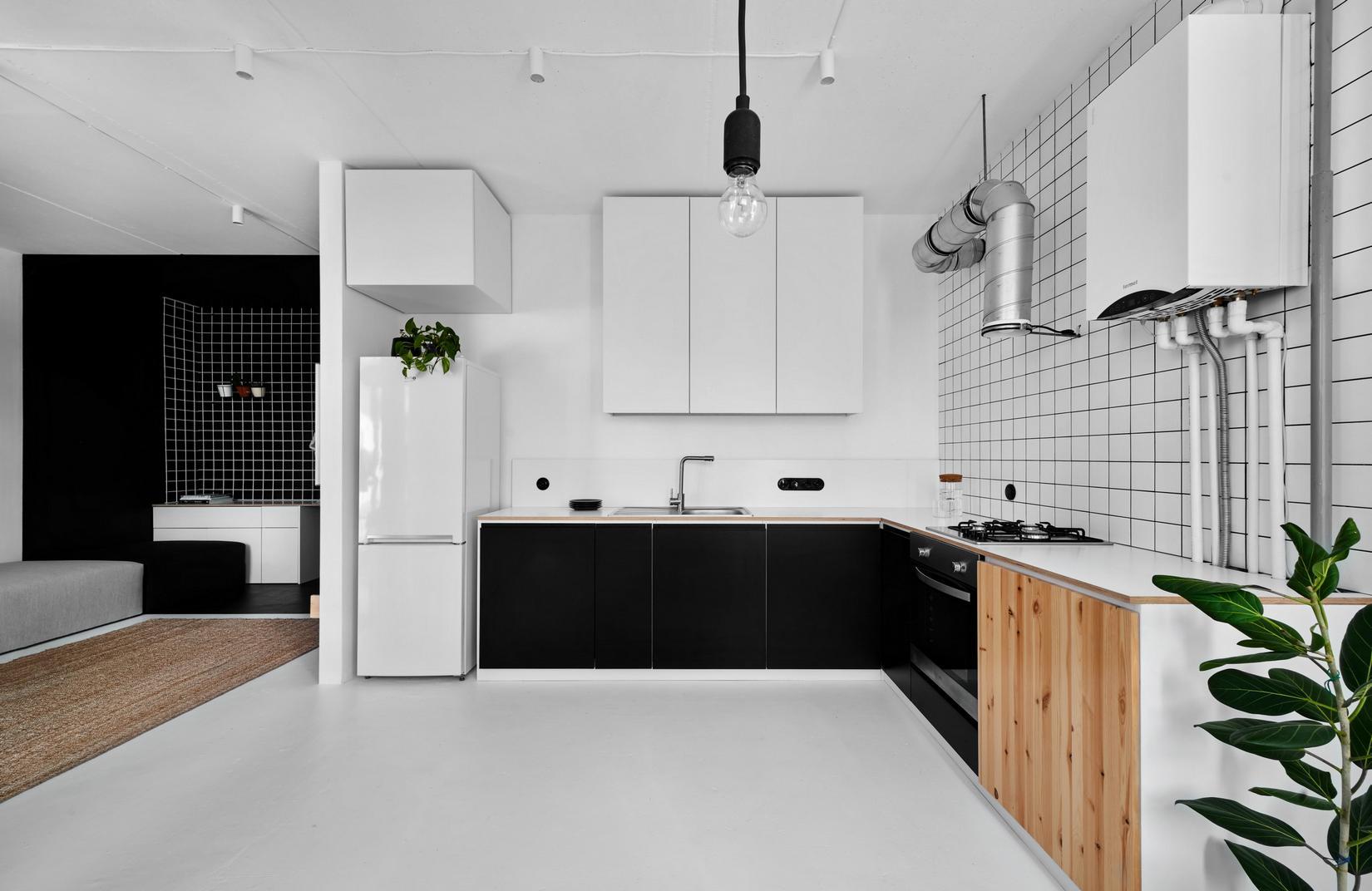 Căn hộ 42m² "chất lừ" dù chỉ sử dụng duy nhất gam màu trắng - đen tối giản